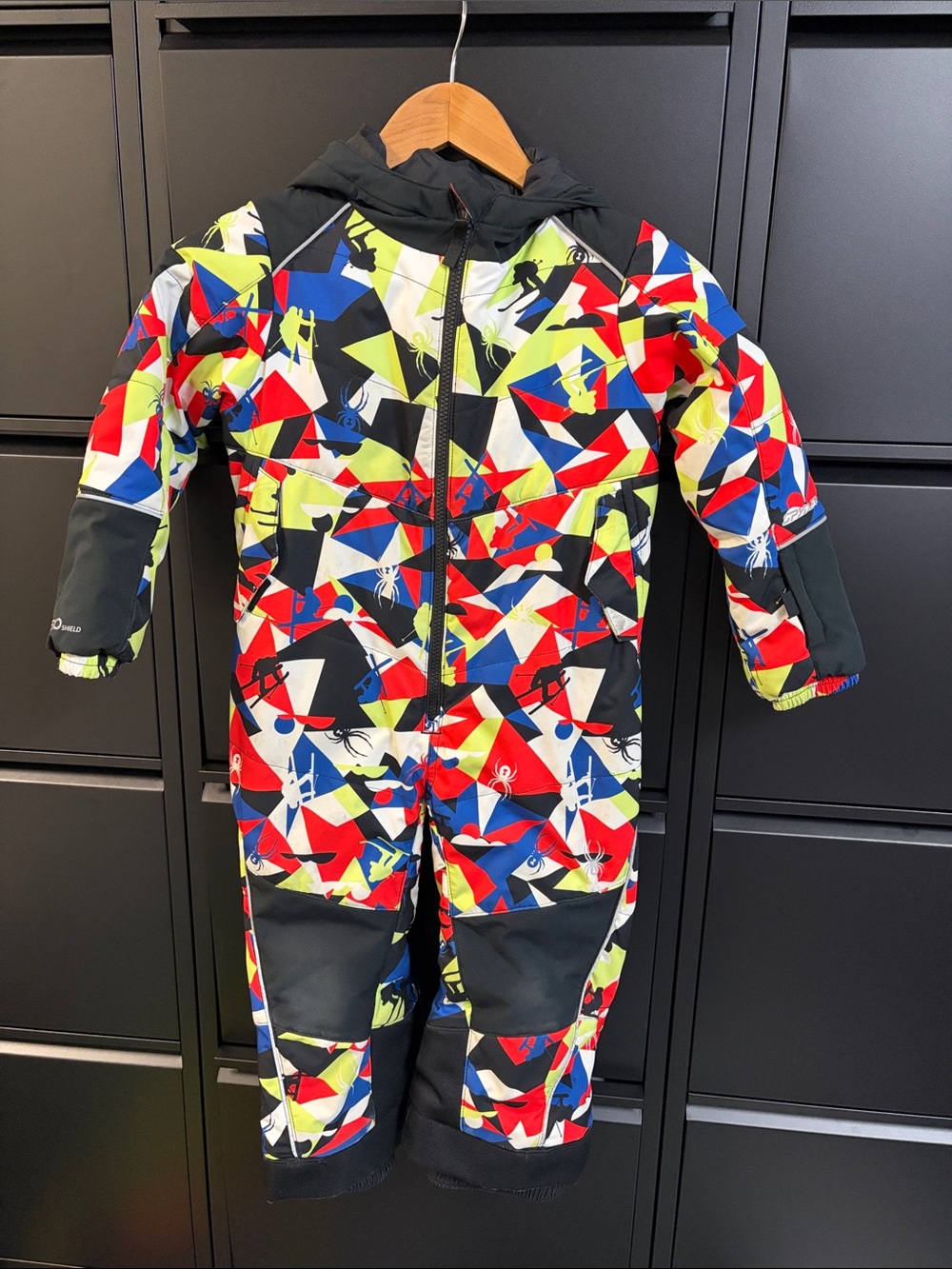 Kids' Geo-Print one piece ski Jacket in Neon Multi
